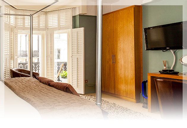 Enjoy the Juliet balcony with outdoor seating & oblique views of the sea and wheel