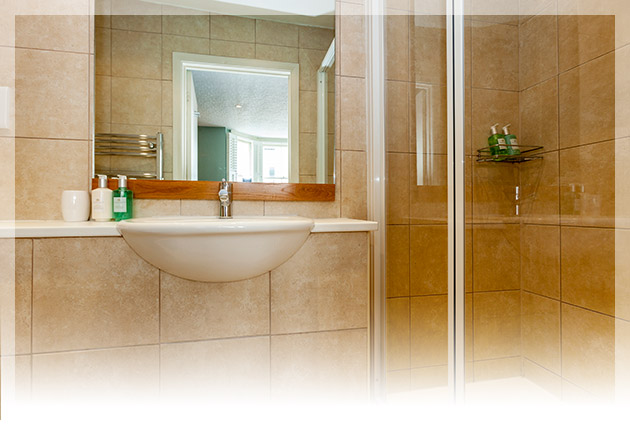 Relax in the modern en-suite with walk in shower