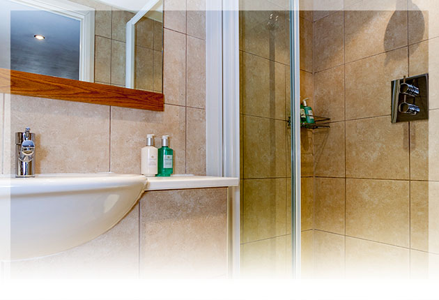 Relax in the modern en-suite with walk in shower