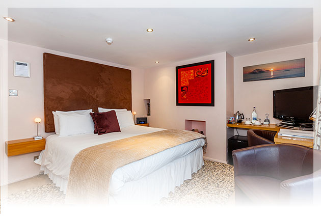Indulge yourselves in the immaculately dressed, modern super-king bed